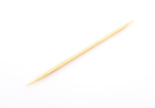Toothpicks on white background Bamboo Toothpicks - Image 1